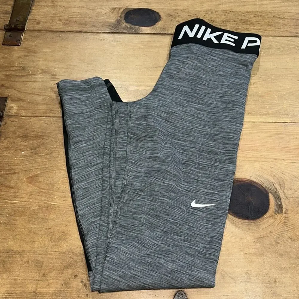 Woman’s Nike Pro Heather Gray with black mesh Leggings Size Small